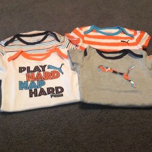 (4) puma onesies size 6-9 months